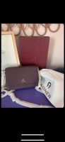 Tasche Aigner WOC Wallet on chain  neu lila plum Nordrhein-Westfalen - Kerpen Vorschau