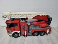 Bruder Scania  560R Feuerwehrauto mit Drehleit,  Licht & Sound Hessen - Mittenaar Vorschau