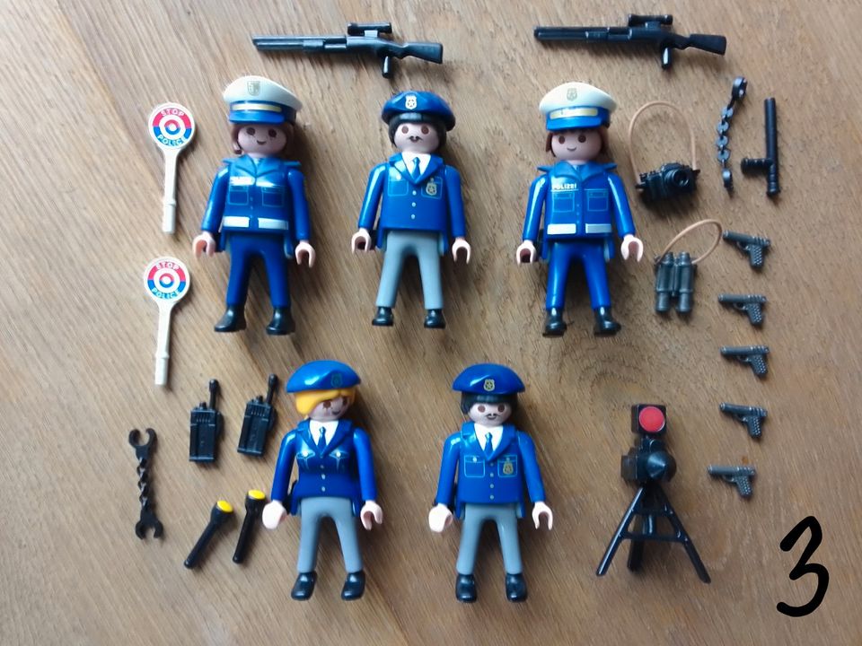 Verkaufe viele Playmobil Sets Polizei SEK Figuren Auto Bus Boot in Fehmarn