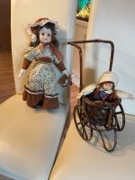 Hübsche Sammlerpuppe aus Porzellan mit Kinderwagen und Kleinkind Rheinland-Pfalz - Konz Vorschau