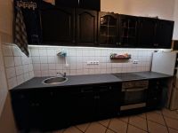 Moderne schwarze Küche mit Kühlschrank Nordrhein-Westfalen - Remscheid Vorschau