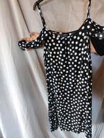schwarzes Sommerkleid mit weißen Punkten in Größe 48 Niedersachsen - Holle Vorschau