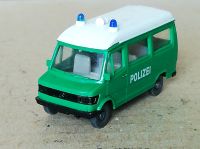 Wiking 14108 Mercedes Benz L 207 D Bus "POLIZEI", grün Niedersachsen - Wiefelstede Vorschau