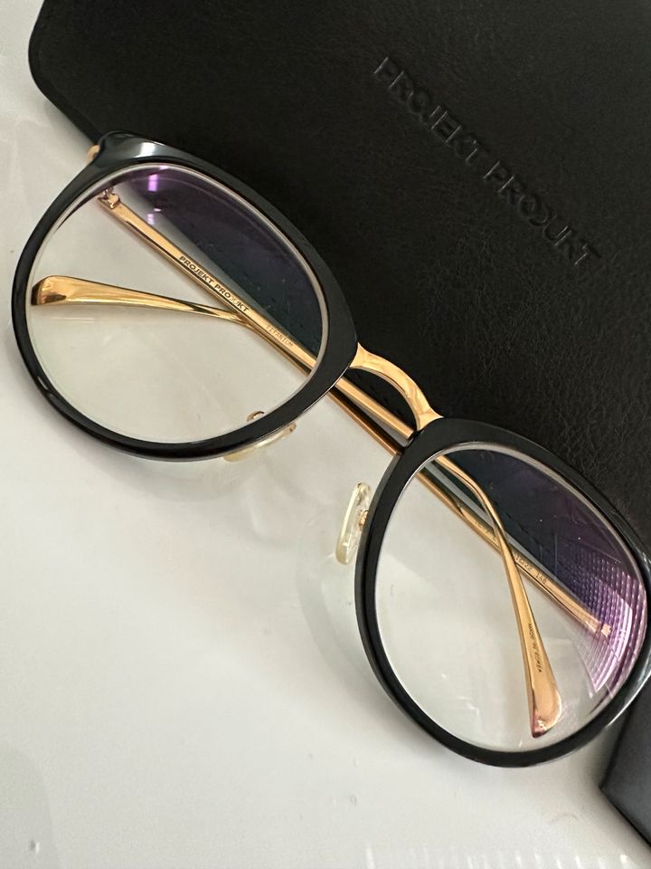 Projekt Produkt Brille schwarz gold in Nalbach