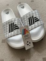 ALDImania Fan Sliders Gr. 43 NEU Aldiletten Nordrhein-Westfalen - Olpe Vorschau