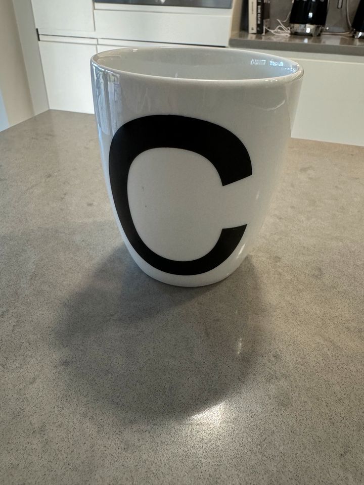 Becher von Openmind mit „C“ in Hagenow