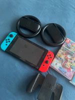 Nintendo Switch mit 4 Spielen und Zubehör! Niedersachsen - Burgdorf Vorschau