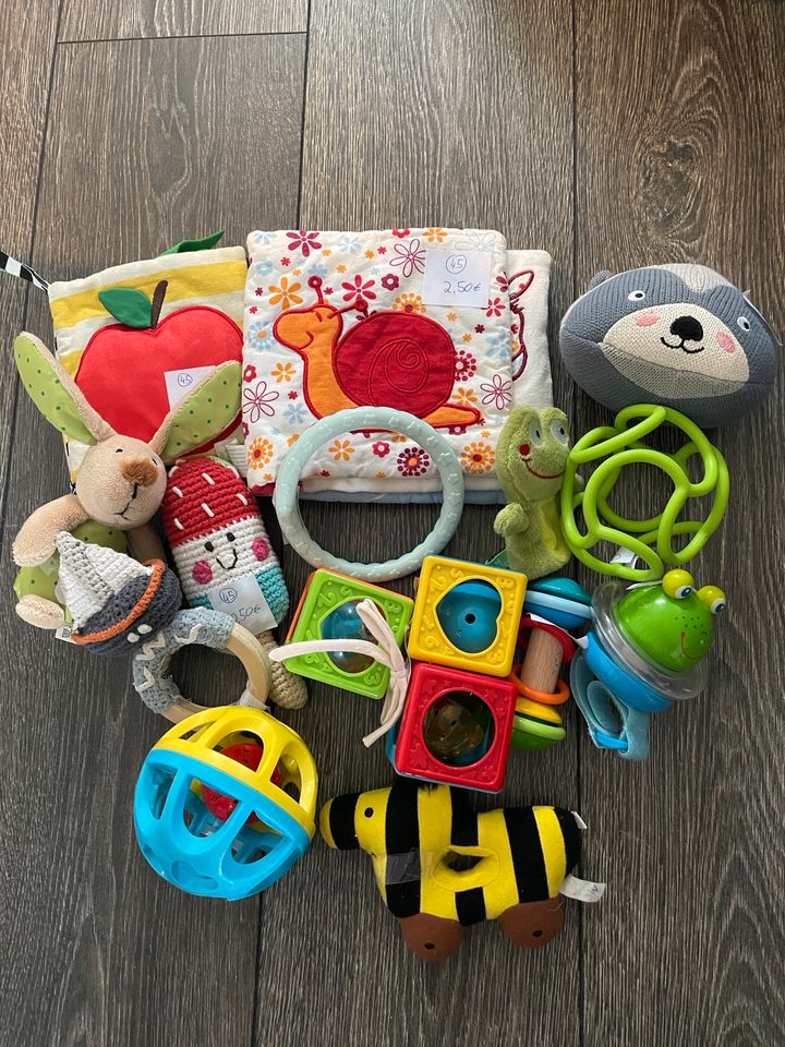 Paket Spielzeug Baby Haba Sigikid Oetinger  Ravensburger u.A. in Malchin