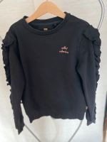 WE Fashion neuwertiger Pulli 134/140 schwarz Baumwolle Rüschen Bayern - Schwarzenbruck Vorschau