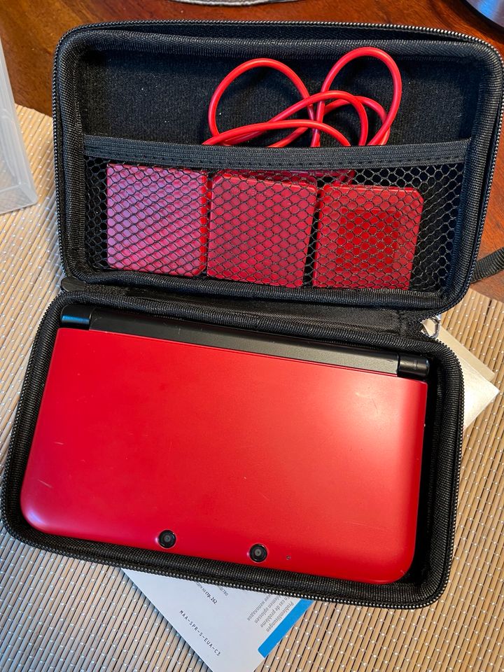 Nintendo 3DS XL Rot mit Schutzhülle und Spielen in Hannover