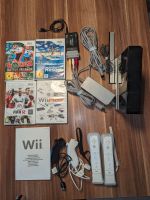 Nintendo Wii Model Rvl-101, 2 Nunchuk, 4 Spiele und Zubehör Rheinland-Pfalz - Mülheim-Kärlich Vorschau