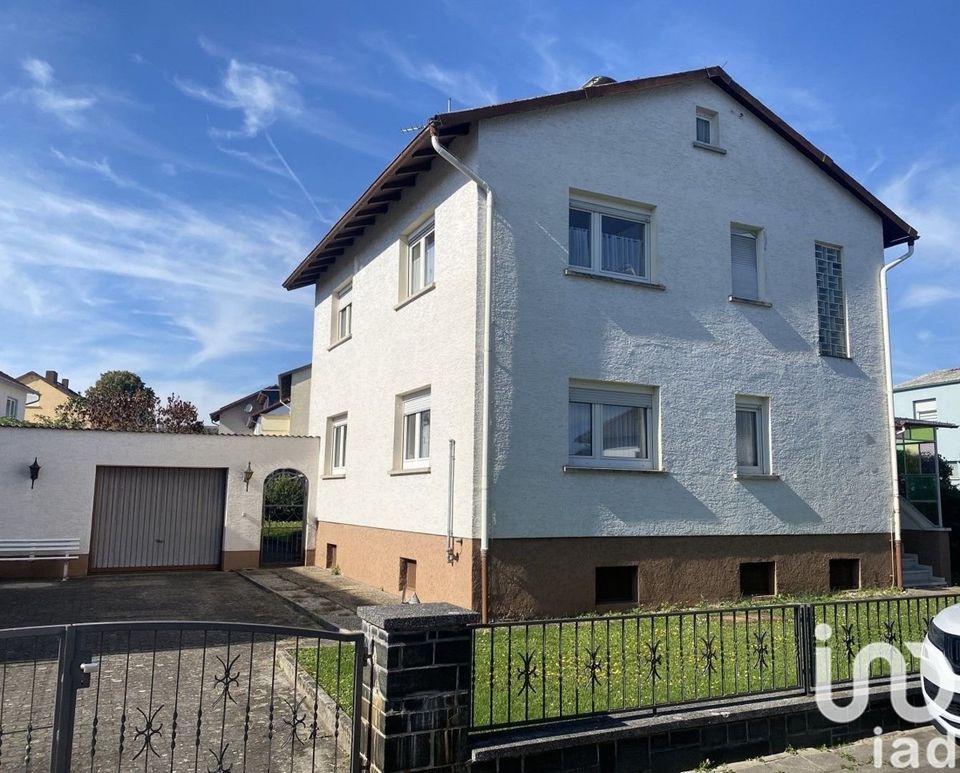 Freistehendes Einfamilienhaus mit Garten und Garage in Wölfersheim