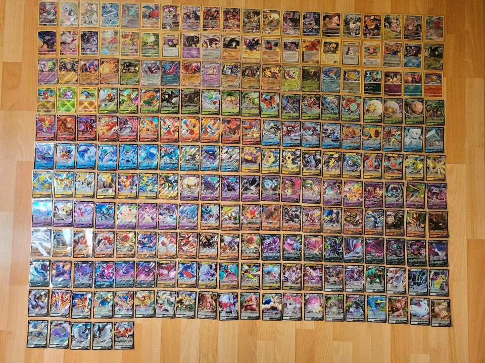 100 Pokemon Karten deutsch boosterfrisch + V ex Booster Holo Tin in Berlin