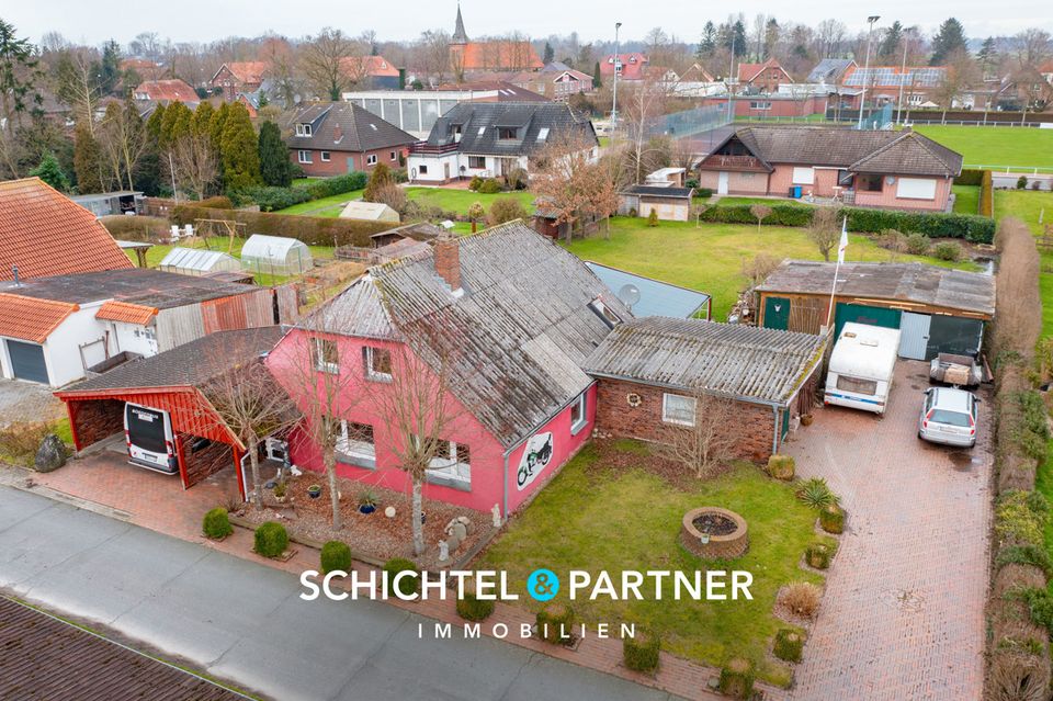 Stadland - Schwei | Großzügiges Einfamilienhaus mit Terrasse, großem Garten & weiterem Baugrundstück in Stadland