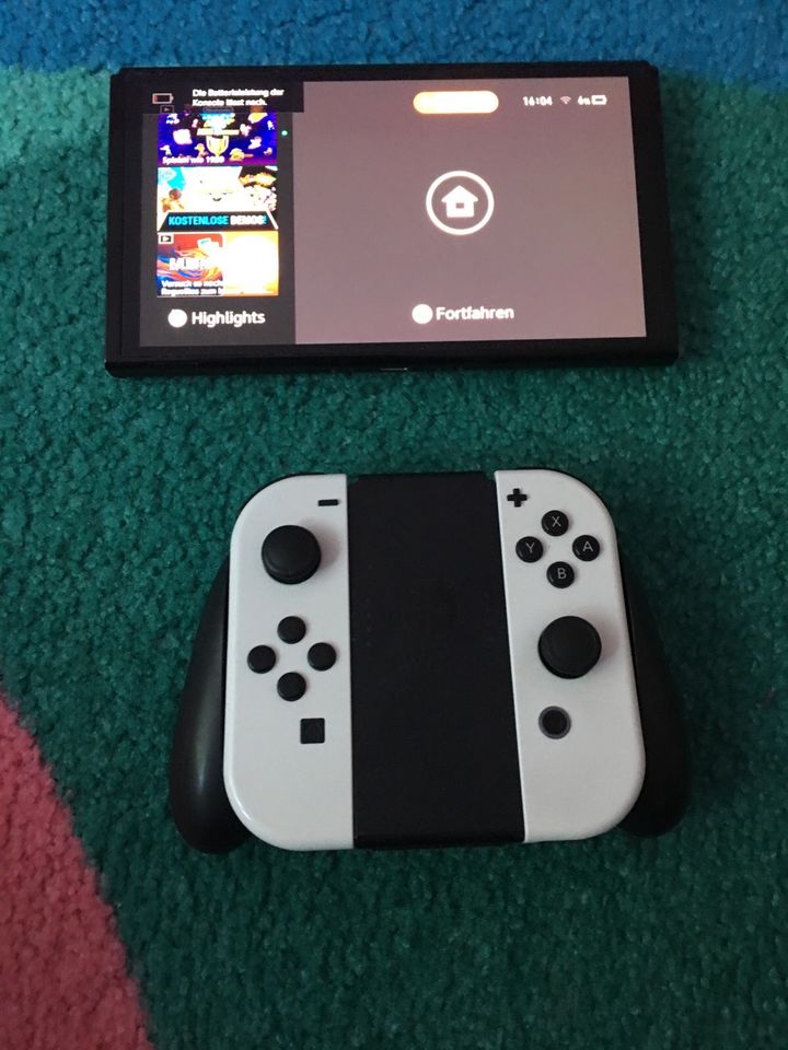 Nintendo Switch Oled Pack + 10 Spiele + Pro Controller in Hamburg