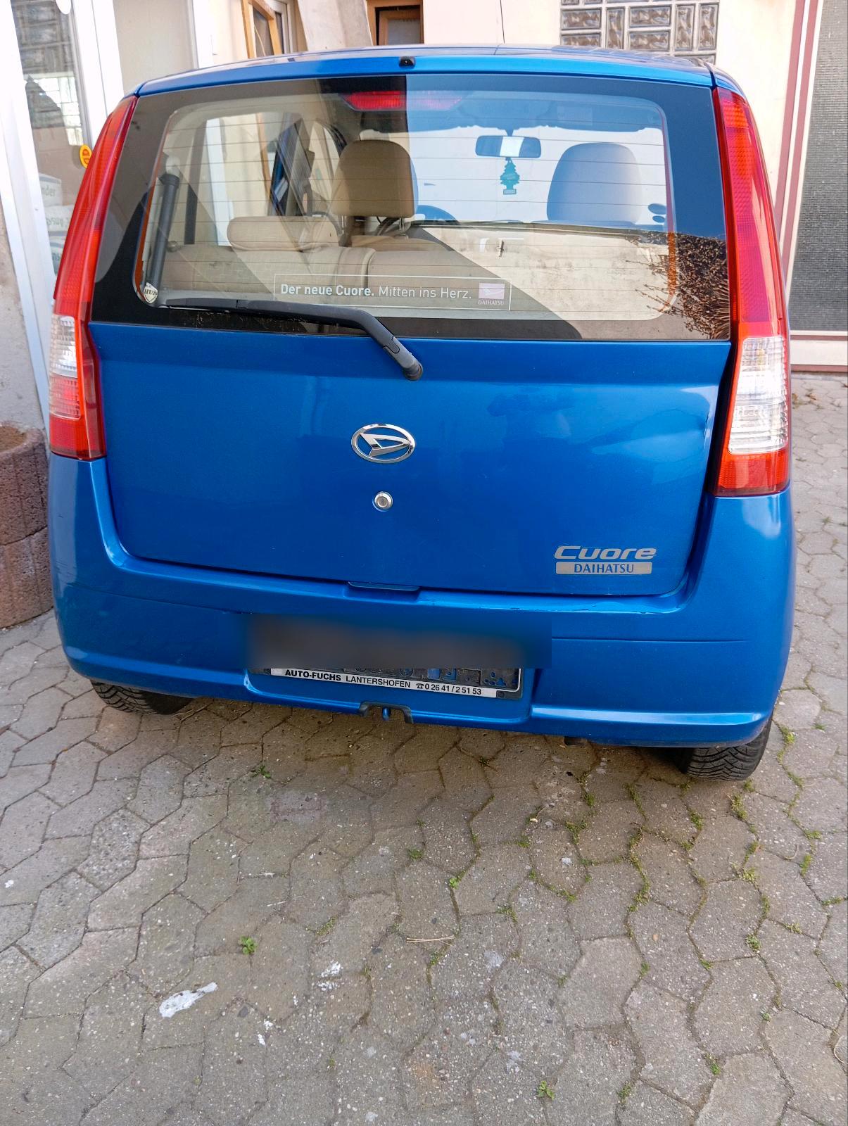 Abbildung des Autos Daihatsu cuore mit TÜV