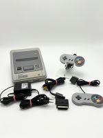 Super Nintendo SNES Konsole inkl Kabeln und 2 Controllern Baden-Württemberg - Filderstadt Vorschau