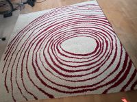Biete Teppich cremefarben mit roten Kringeln Hessen - Linsengericht Vorschau