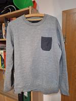 Grauer Pullover mit karierter Brusttasche, Größe L Berlin - Niederschönhausen Vorschau