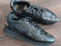 Puma Turnschuhe Sneaker Größe 41 schwarz neuwertig Hessen - Burghaun Vorschau