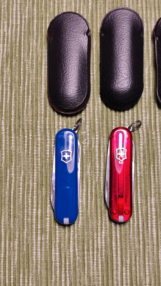 3 x Victorinox Schweizer Taschenmesser blau, rot, rot transparent in Bergisch Gladbach