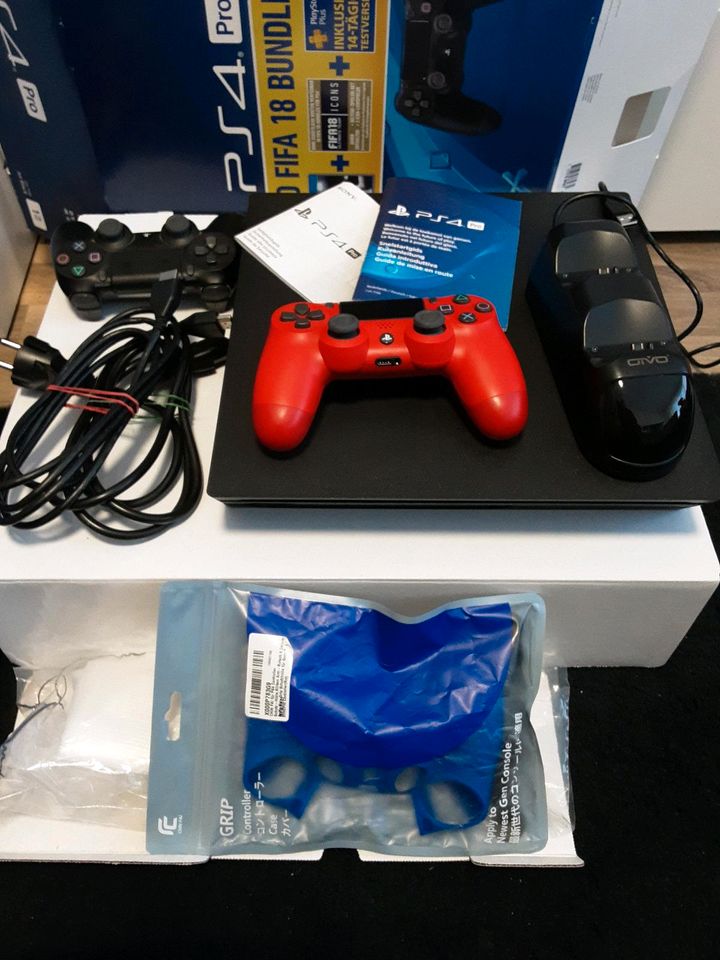 PS4 PRO 1TB mit 2 Controller und Ladestation und Zubehör in Frankfurt am Main