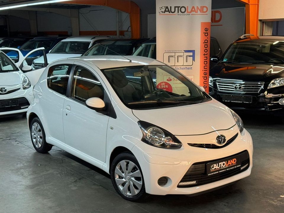 Toyota Aygo Cool Go*NUR 62 TKM*NAVI*KLIMA*4/5TÜRER*MWST in Troisdorf