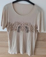 T-Shirt Gr. M beige 2 schwarze Raubkatzen braun TOP Niedersachsen - Bad Pyrmont Vorschau