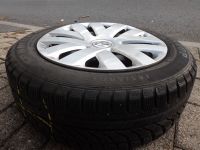 Winterreifen mit Stahlfelgen Radkappen von VW Polo 185/60R15 88T Baden-Württemberg - Heidelberg Vorschau