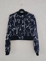 Dünne schwarze Jacke mit Gesicht-Muster in weiß Hessen - Münster Vorschau