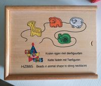 Fädelspiel Kette fädeln mit Tierfiguren Nordrhein-Westfalen - Leverkusen Vorschau