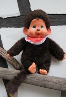 Monchhichi Monchichi  mit rotem Lätzchen ca. 40cm Nordrhein-Westfalen - Leverkusen Vorschau