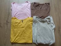 drei Shirts neuwertig und Weste Strick Gr. L XL 42 44 Hessen - Nidda Vorschau