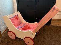 HABA 950 Puppenwagen Lauflernwagen rosa mit Kissen, Decke Bayern - Herzogenaurach Vorschau