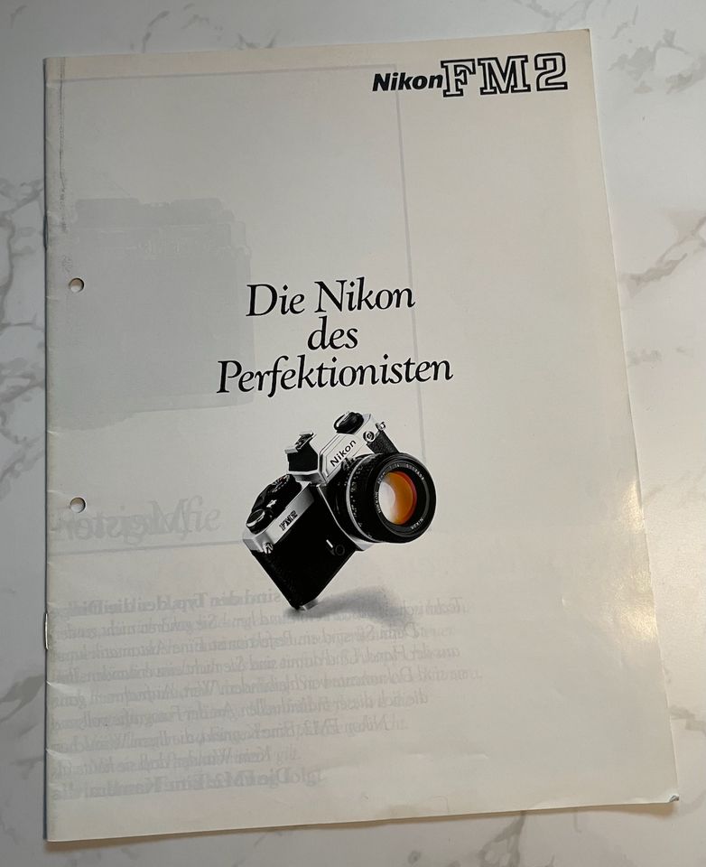 Nikon FM2 Prospekt + Nikon Objektive- u. Systemzubehör-Prospekte in Wangen im Allgäu