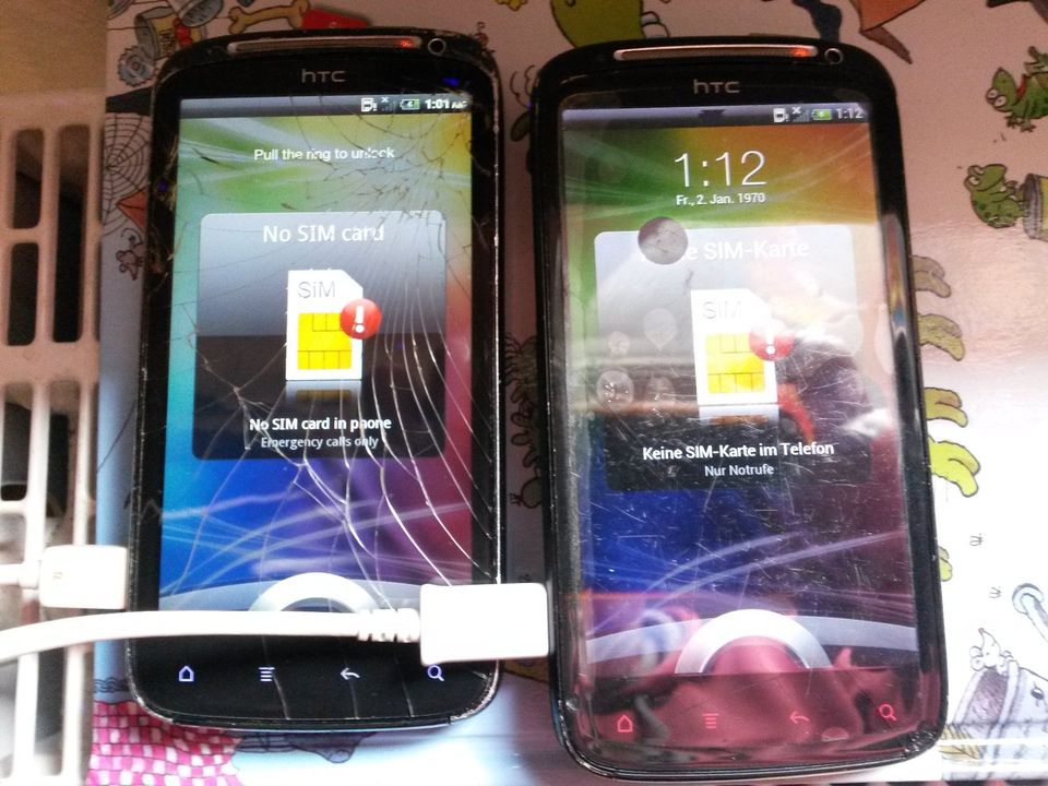 2x HTC Sensation Z710e mit mehreren Akkus - Display beschädigt in Miltenberg