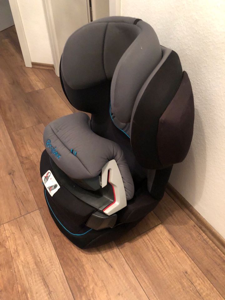 Cybex Juno 2 fix schwarz/grau 9-18kg, Fangkörper, Isofix in Eichenzell