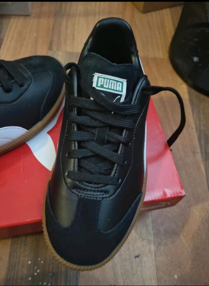 PUMA King sneakers in schwarz/ weiss in Greven