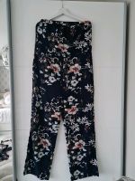 Trägerloser Jumpsuit mit Blumenmuster dunkelblau Nordrhein-Westfalen - Geilenkirchen Vorschau