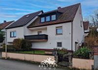 ZWEIFAMILIENHAUS MIT DOPPELGARAGE, GARTEN UND PERGOLA: MODERNISIERUNGSBEDÜRFTIG MIT VIEL POTENZIAL UND HERRLICHEM AUSBLICK IN DIE FRÄNKISCHE RHÖN! Bayern - Maßbach Vorschau