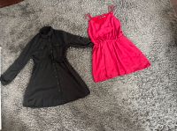 Schwarzes Kleid und rotes Kleid Dithmarschen - Heide Vorschau