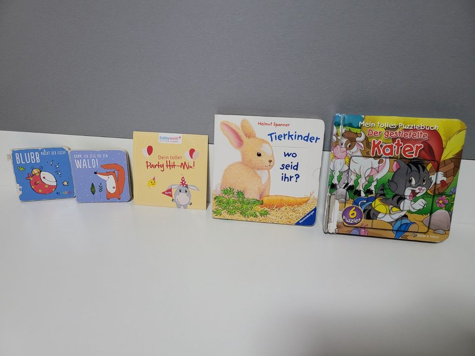 Vier Kinderbücher Babybücher Puzzle Kinder Musik Tierkinder in Berlin