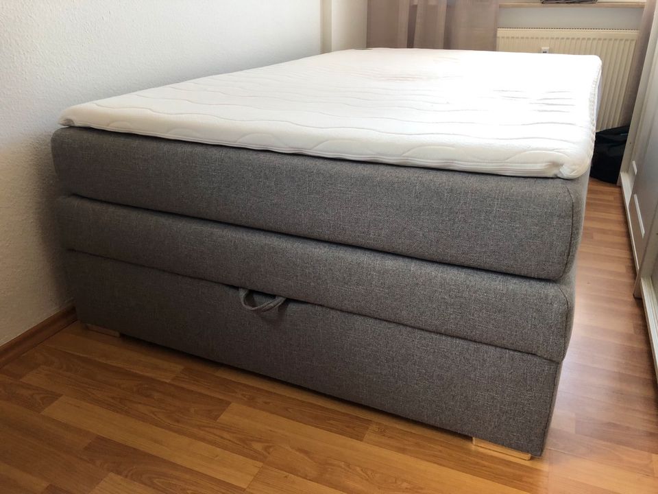 Jockenhöfer Boxspringbett mit Bettkasten und Topper, grau in Dobel