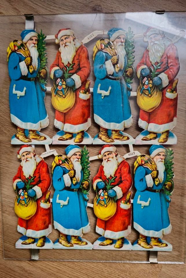 Glanzbilderbogen 4557 (Weihnachtsmann/Weihnachten) im Glasrahmen in Stadthagen