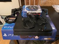 PlayStation 4 slim 1TB mit 5 spielen 2 Kontrollern und hdmi Kabel Niedersachsen - Lüneburg Vorschau