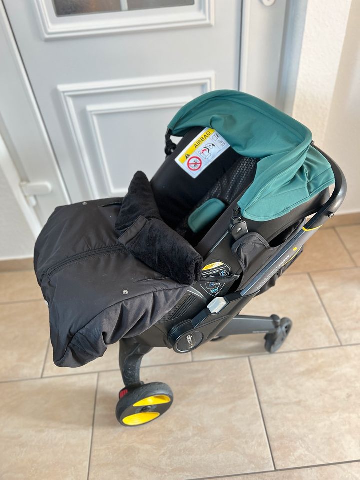 Doona + Babyschale/Kinderwagen in Schleiden