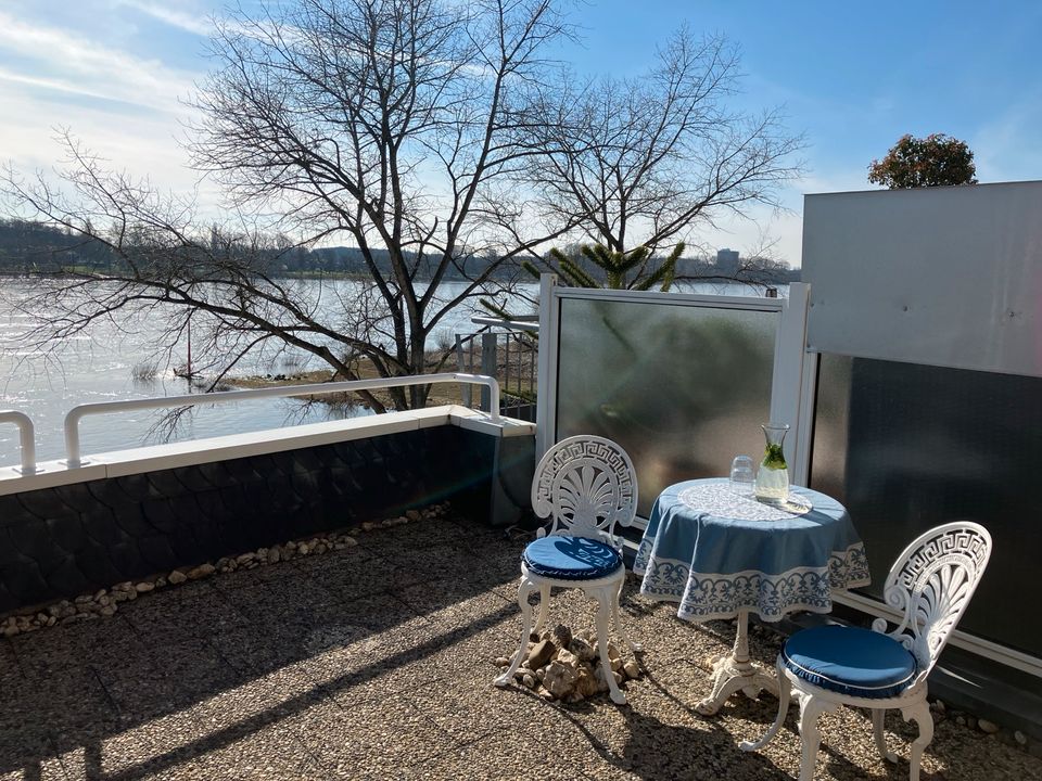 Wohnen am Wasser, große Sonnenterrasse mit traumhaftem Rheinblick in Köln