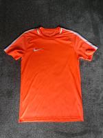 Neuwertiges neonoranges Funktionsshirt von Nike Niedersachsen - Leer (Ostfriesland) Vorschau