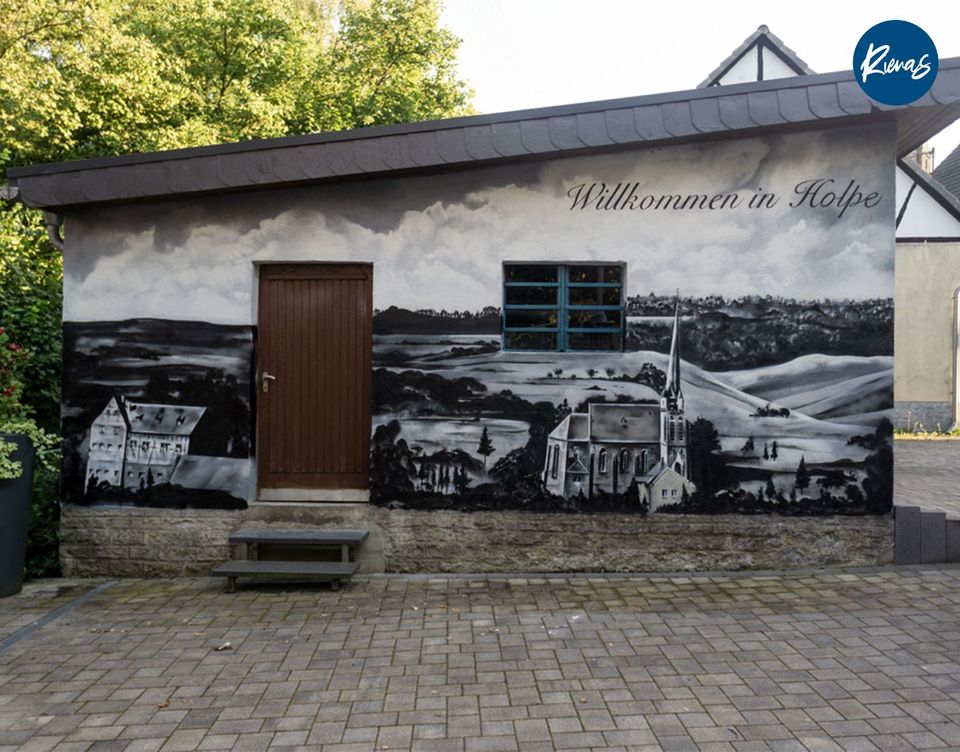 Professioneller Graffiti Künstler, Graffiti Sprayer, Wandmalerei in Köln