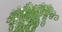 3 Tüten Swarovski ® Kristalle 4mm Doppelkegel hell grün Niedersachsen - Bockenem Vorschau